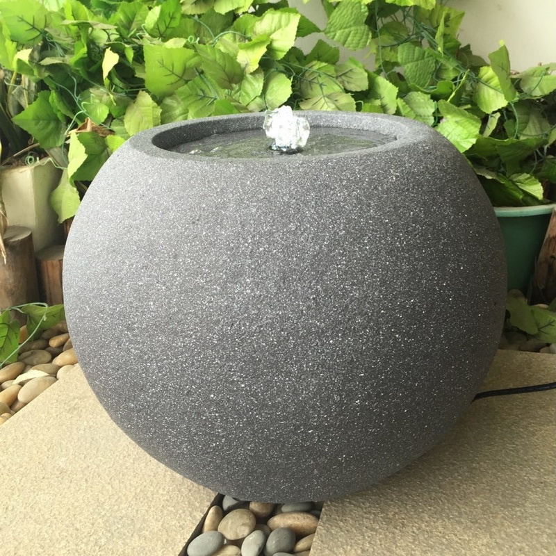 Fontaine à eau circulaire en surface en pierre pour la décoration de jardin